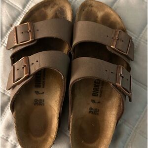 Birkenstock tan with rose gold buckle